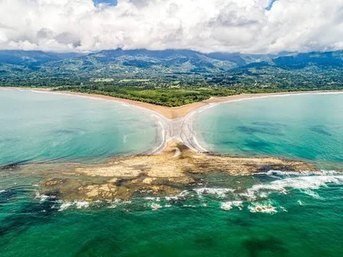 Aerial view of the Whale Tail sandbar formation at Marino Ballena National Park extending into the Pacific